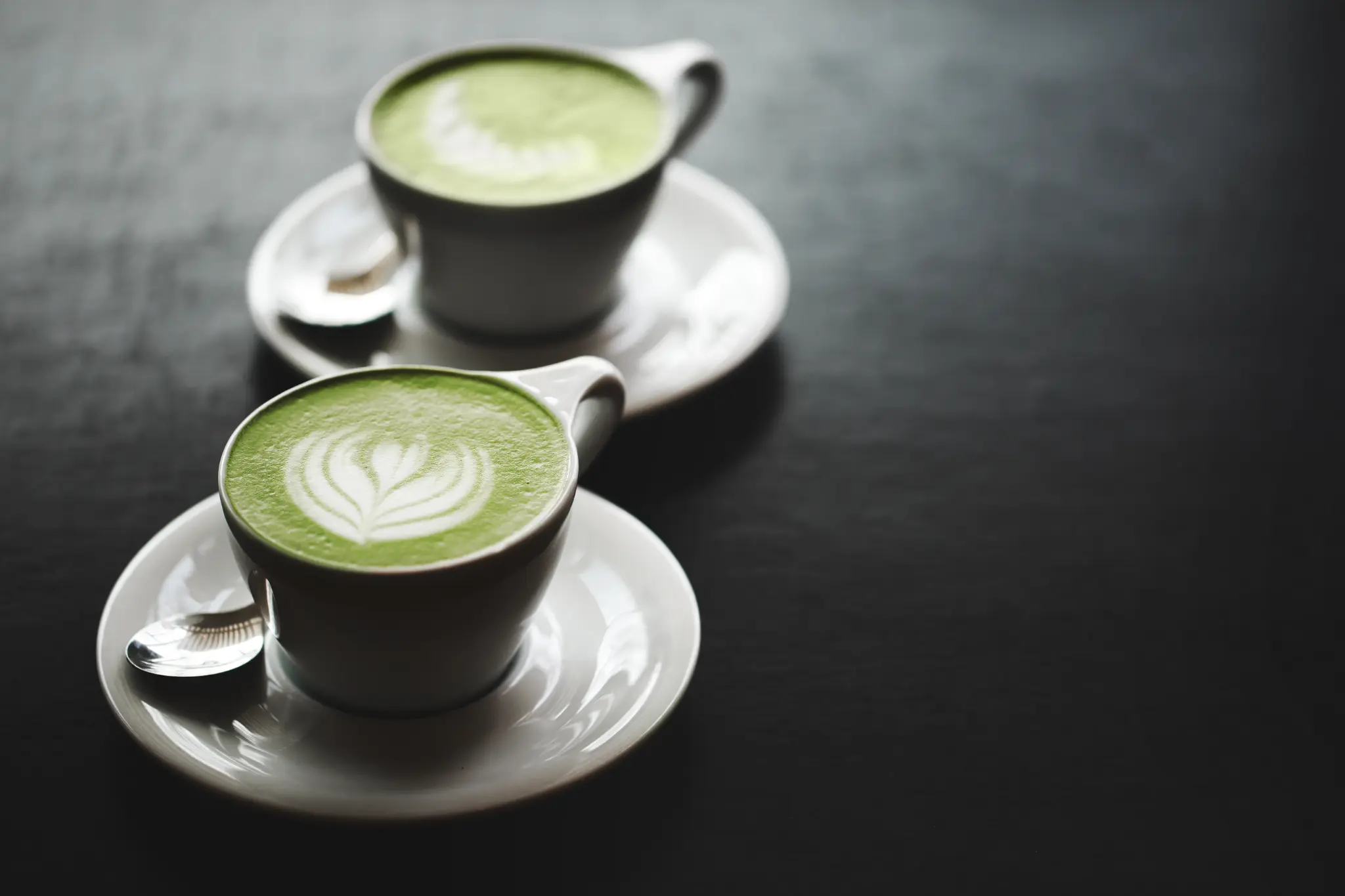 Matcha bar hire for events - Two cups of premium matcha latte with latte art
